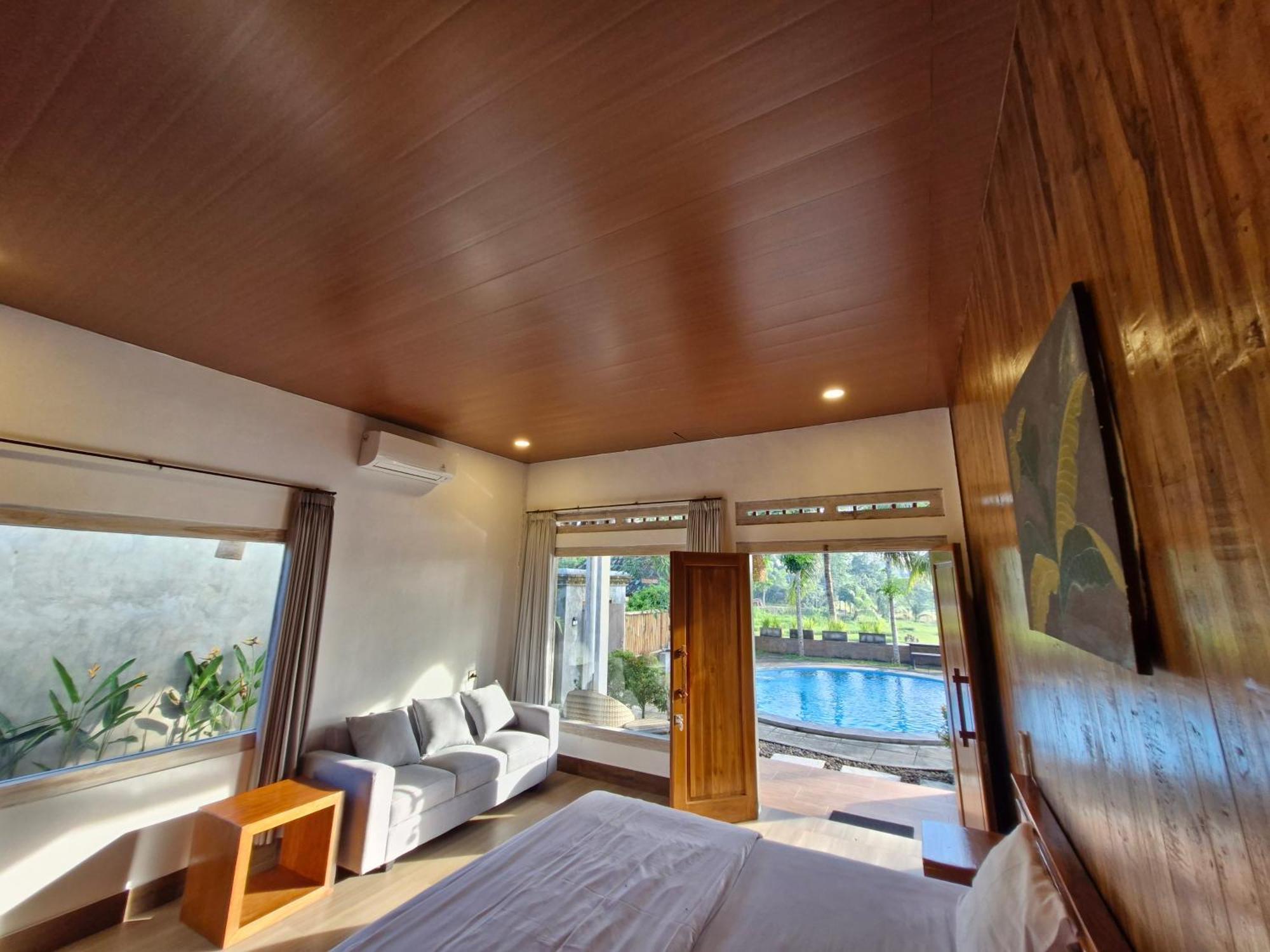 Peraja Bungalows Loyok Sangyang Rum bild